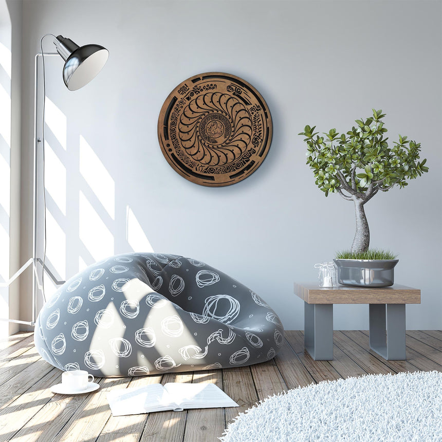 Carved wooden artwork with “Nun, by the Pen, and what they write” in a living room.