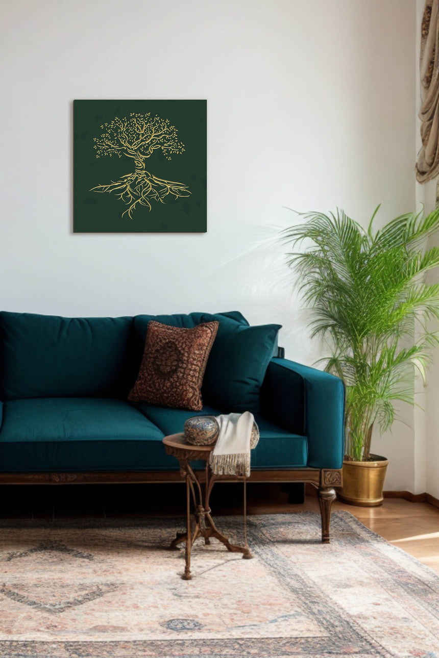 Wooden artwork of an olive tree with the Arabic phrase “The land is ours, and to it we return.” in a living room.