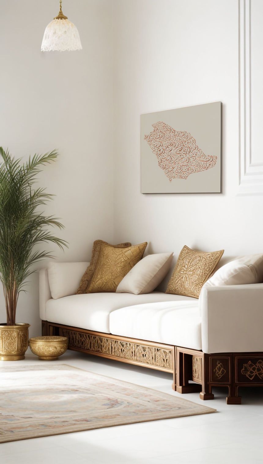 Carved wood artwork of the Saudi Arabia map, drawn in Diwani calligraphy using the names of its cities, in a living room setting