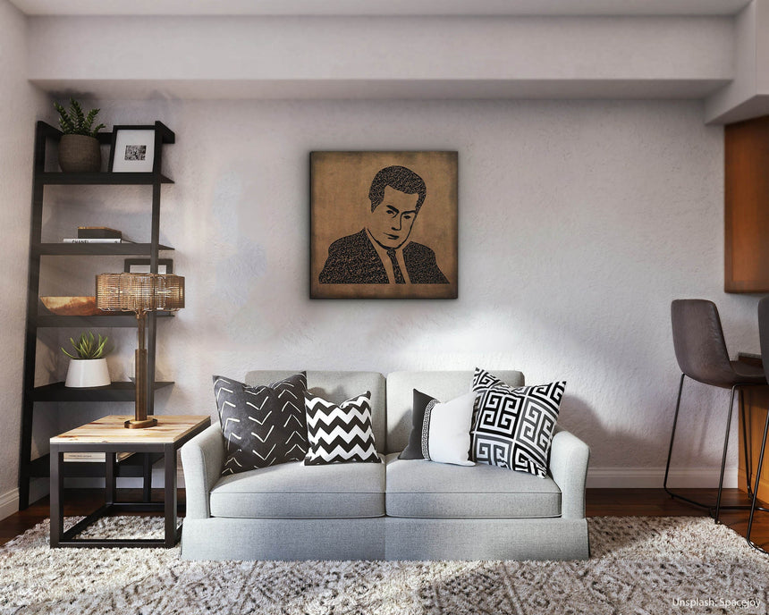 Carved wood portrait of Farid al-Atrash with “Ya Habaybi Ya Ghaybin” in a living room.