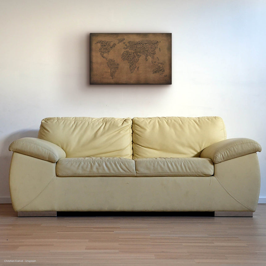 Carved wood artwork of the world map, featuring country names in a living room.