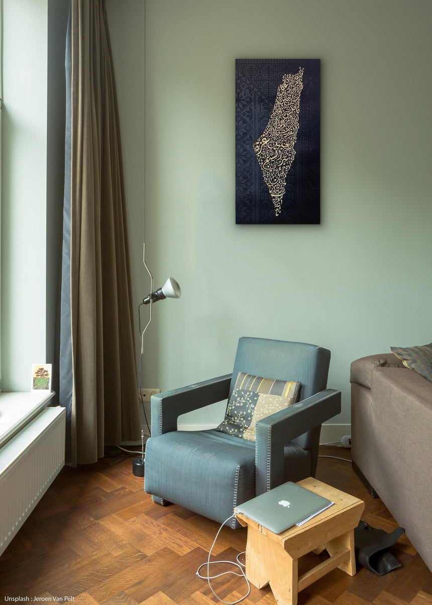 Palestine map in Diwani calligraphy using the names of its cities, with Palestinian tatreez–inspired embroidery in a living room.