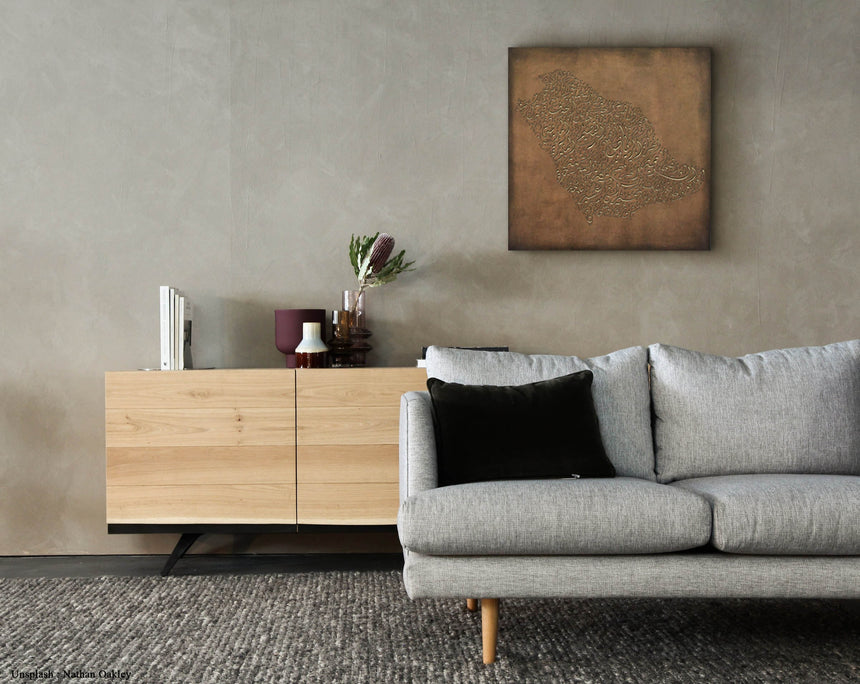 a living room with a couch and a sideboard