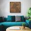 a living room with a blue couch and a coffee table