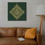Carved wooden artwork of Surah An-Nas in a living room