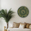 a living room with a couch and a potted plant